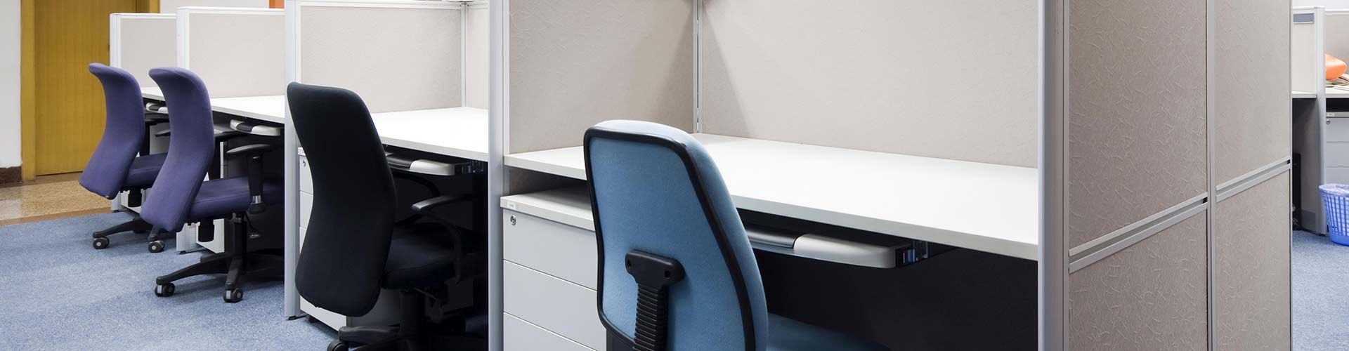 A blue chair in an office maintained by ELEET